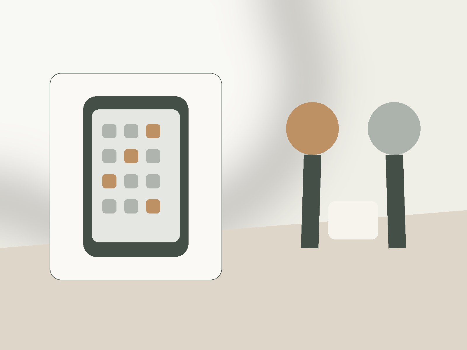 Phone resting out of reach while two people talk across a table